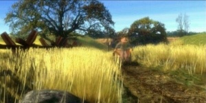 A farmer, quietly pulling his cart